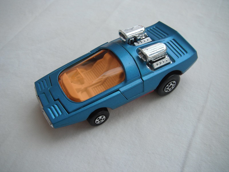 6. Metallic blue body/K36/K41 dk.red base/lt.amber windshield/white interior.