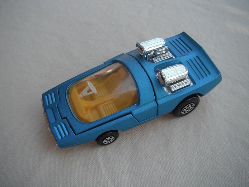 5. Dk.metallic blue body/K36/K41 dk.red base/clear windshield/dk.yellow interior.