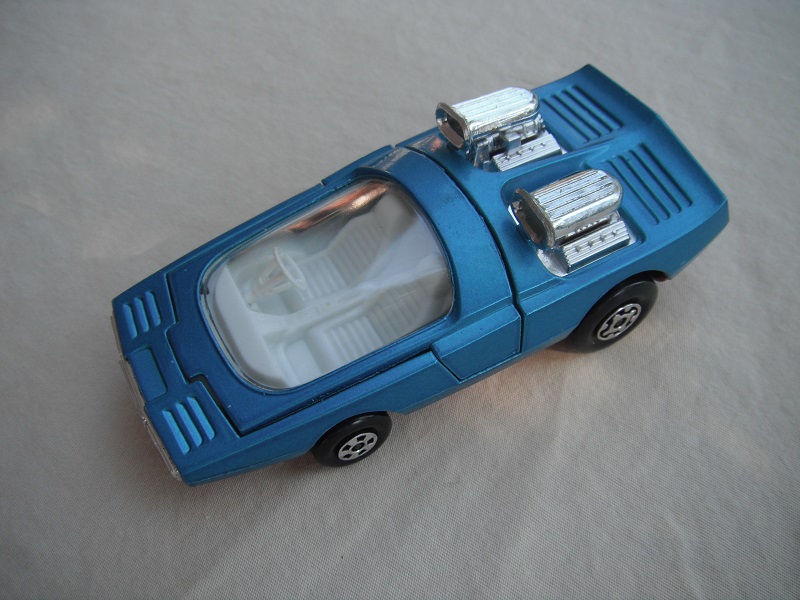 4. Dk.metallic blue body/K36/K41 dk.red base/clear windshield/white interior.