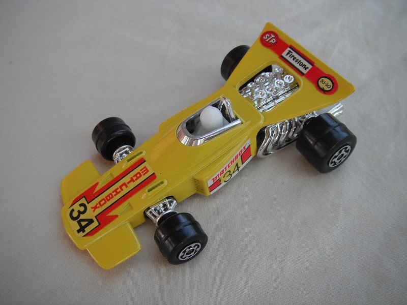 6. Yellow body/unpainted Speedkings base/wider rear wheels/white driver/&quot;Matchbox 34&quot; yellow labels.