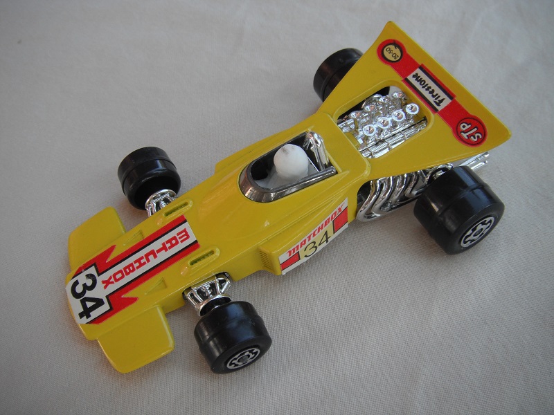 5. Yellow body/unpainted Speedkings base/large rear wheels/opaque driver/&quot;Matchbox 34&quot; white labels/upside down rear lbl.