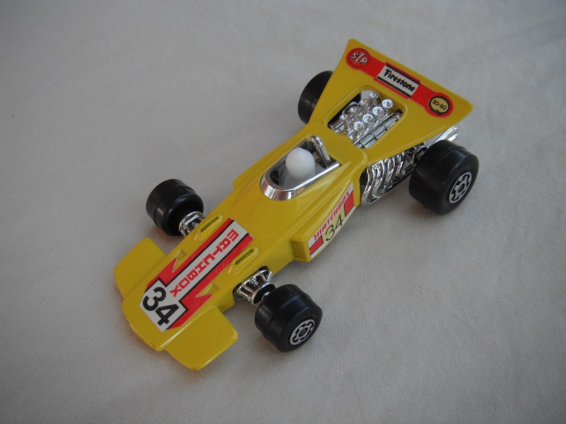 4. Yellow body/unpainted Speedkings base/large rear wheels/opaque driver/&quot;Matchbox 34&quot; white labels.