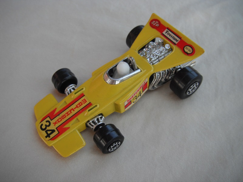 3. Yellow body/unpainted Speedkings base/large rear wheels/opaque driver/&quot;Matchbox 34&quot; yellow labels.