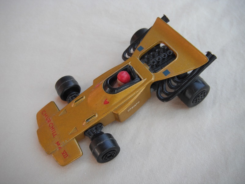 1. Gold body/unpainted Speedkings base/wider rear wheels/white driver w/red helmet/&quot;Churchill MK V11&quot; decals/PP.