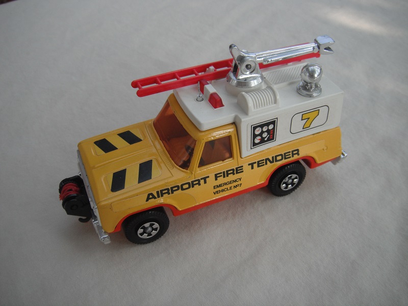 3. Yel body/wht canopy/red base/red dome lts/red ladder/dk.amb windows/lrg steering/&quot;Airport Fire Tender&quot;/gauges &amp; 7 label/red cable.