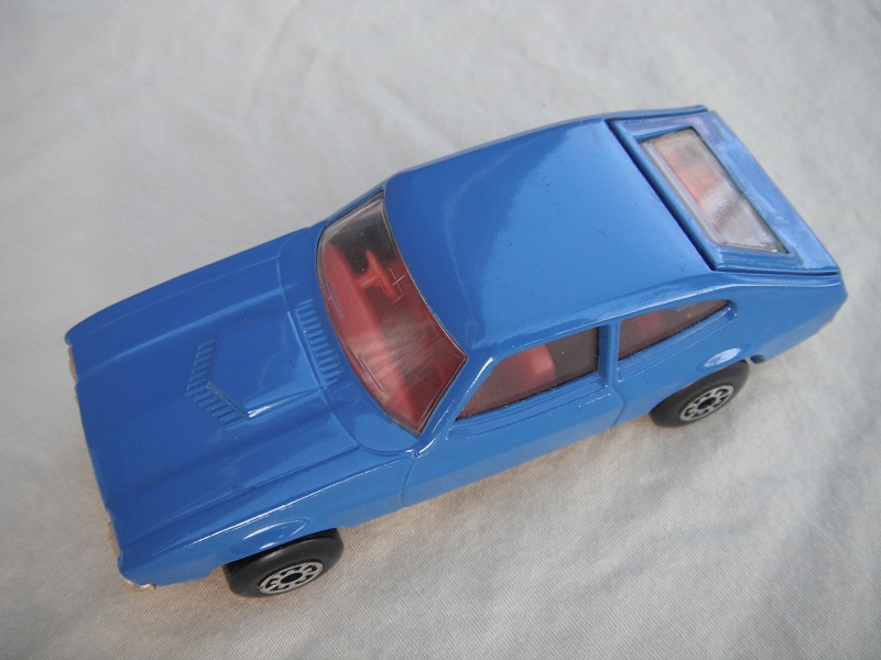 B13.Blue body/silver superkings base/5 arch wheels/red interior/clear windows.