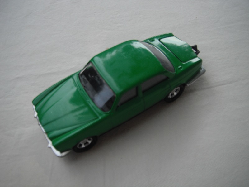 B2. Green body/gloss black base/Superkings/5SM whls/clear windows/black interior &amp; tow hook.