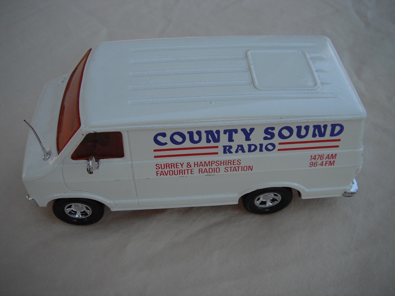 17. White body/black base/red interior/amber windows/black steering wheel/County Sound Radio Promo.