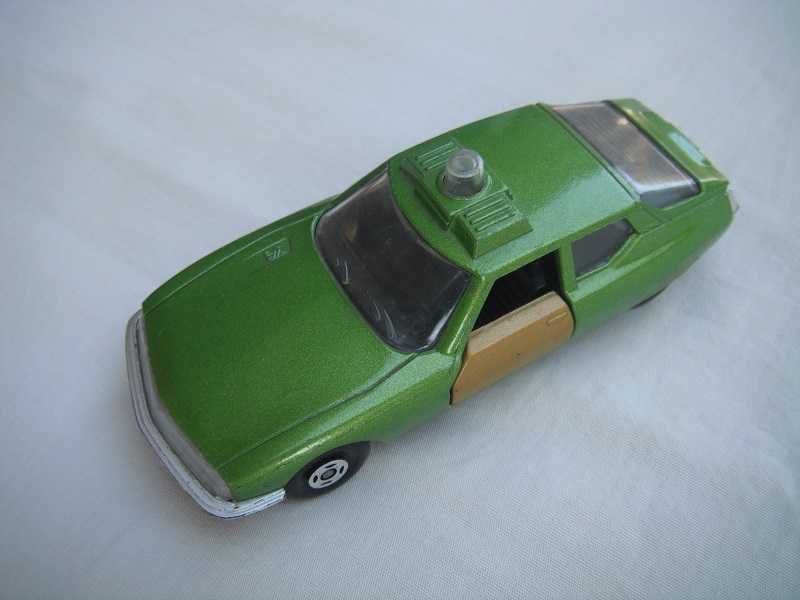 8. Light green body/black base/Bulgaria/black interior/gold side doors/clear windows/no tow hook/no labels.