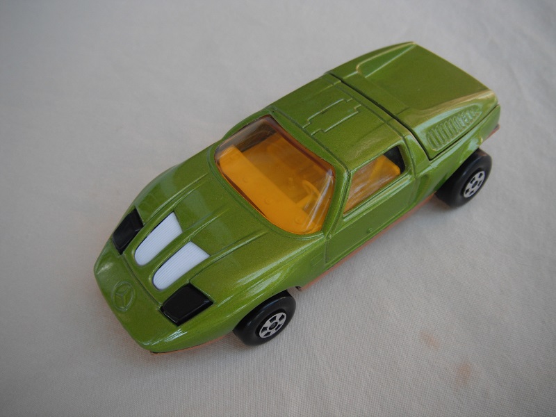 E17. Lime green body/dark gold base/five spoke wheels/amber windows/white interior/black headlights.