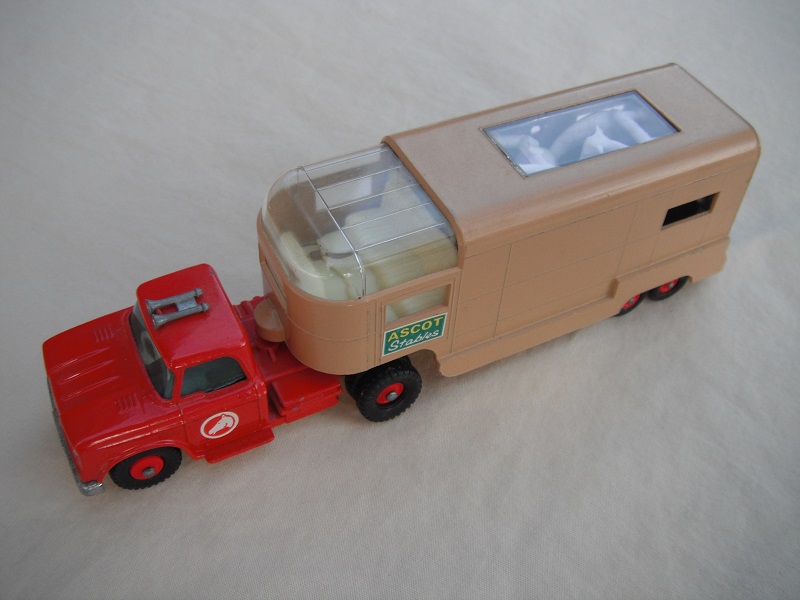 19.Red cab/type B base/red horse label/tan trailer type B/green Ascot Stables label/type B rear door/white axle spring/olive green interior.