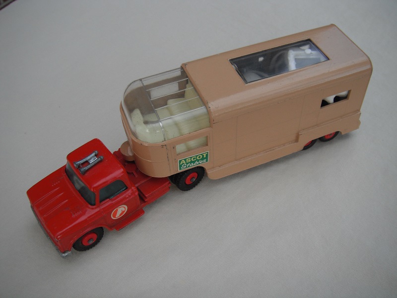 13.Red cab/type B base/lt.red horse label/tan trailer type B/green Ascot Stables label/type B rear door/white axle spring/burgundy interior.