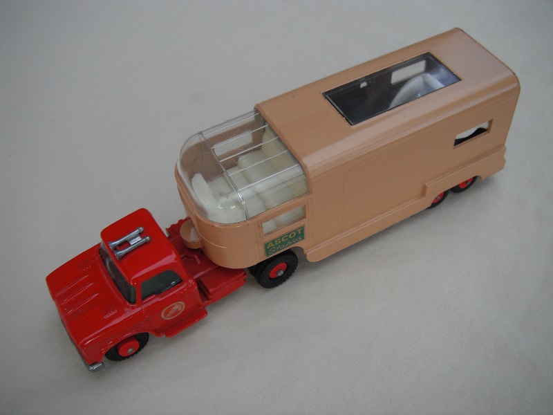 12 Red cab/type B base/lt.red horse label/lt.tan trailer type B/green Ascot Stables label/type B rear door/white axle spring/dark green interior.