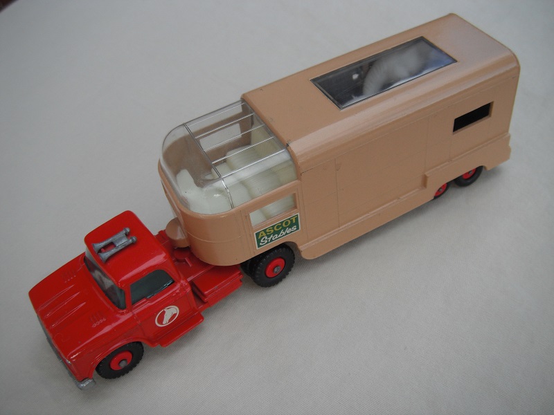 3. Red cab/type A base/red horse decal/tan trailer type B/dk.green Ascot Stables label/type B rear door/red axle spring/gray interior.