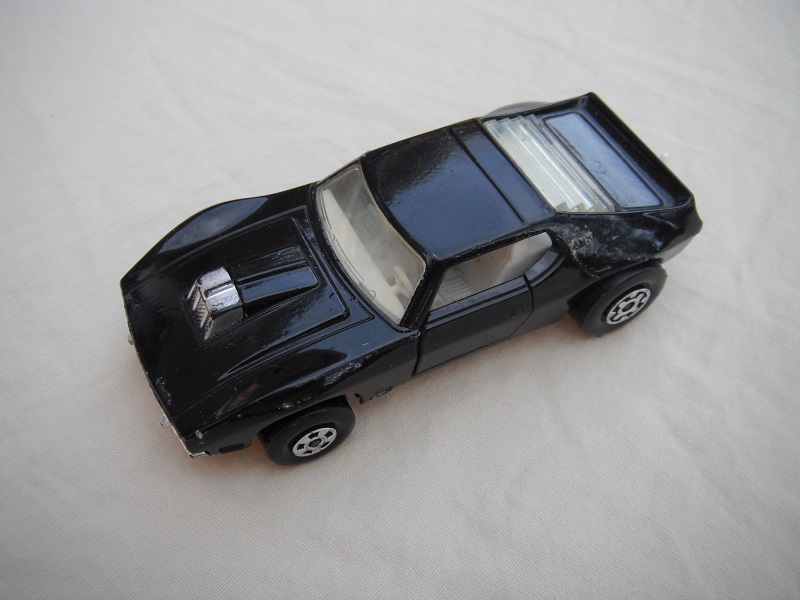 12.Black body/silver Super Kings base/white interior/clear windows/no labels.