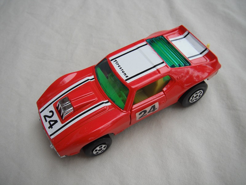 10.Red body/silver Super Kings base/yellow interior/green windows/&quot;24&quot; on doors and hood, &quot;Firestone&quot; on top.