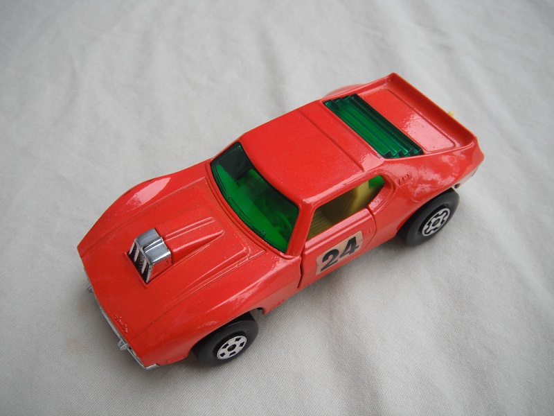 6. Red body/silver Speed Kings base/yellow interior/dark green windows/&quot;24&quot; on doors.