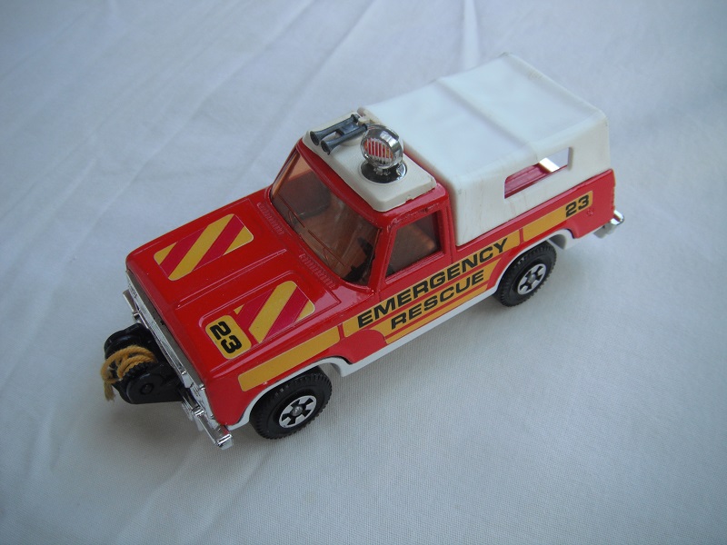 3. Red body/wht canopy/off wht base/no K#/Superkings/amber windows/&quot;Emergency Rescue&quot;/labels/&quot;23&quot; on hood/left side/&quot;23&quot; to rear.