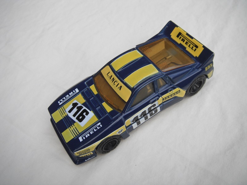 9. Dark blue body/yellow stripes/black base China/amber windows/gray interior/no chromed lettering on wheels/Pirelli #116.
