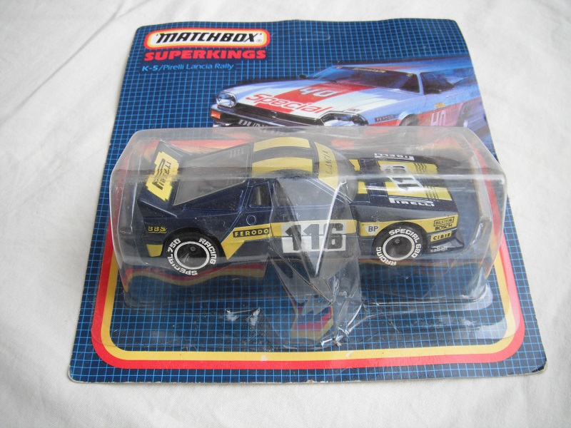 7. Dark blue body/yellow stripes/black base China/clear windows/gray interior/chromed lettering on wheels/Pirelli #116.