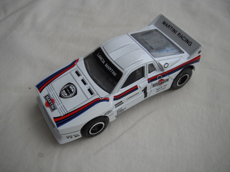 3. White body/red &amp; blue stripes/black base China/clear windows/gray int/no chromed letters on wheels/large rear wheels/Martini racing #1.