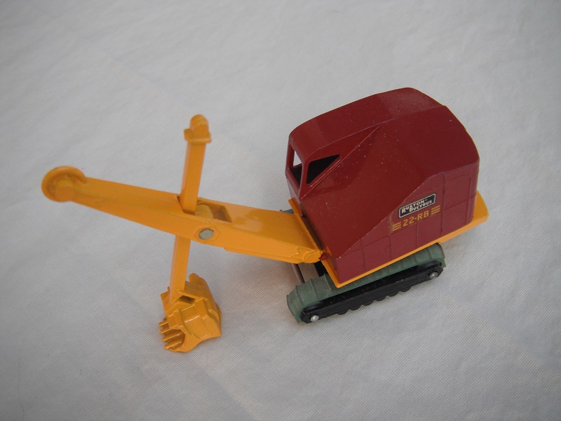 9. Maroon cab/type B/round rivet/dk.yel jib/gloss black base/riveted axles/green tracks/yellow side decals/large on rear.