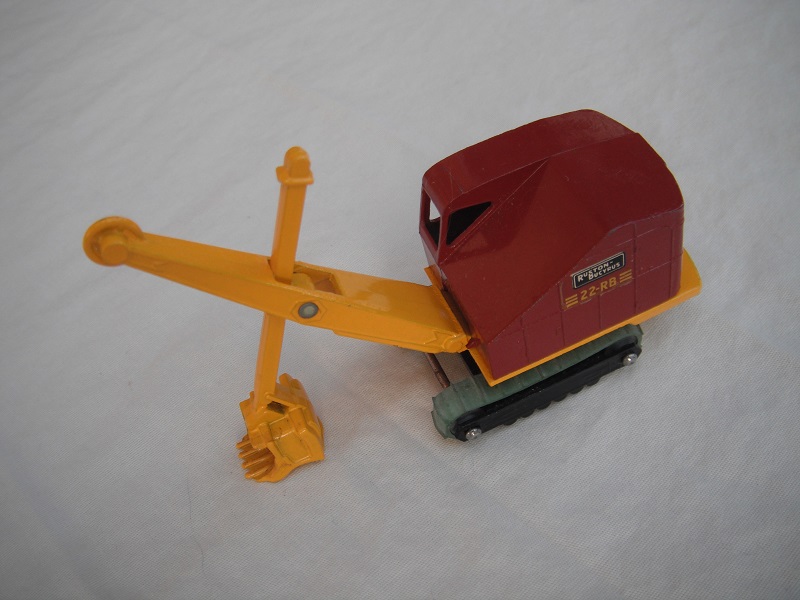 8. Maroon cab/type B/round rivet/yellow jib/gloss black base/riveted axles/green tracks/yellow side decals/large on rear.