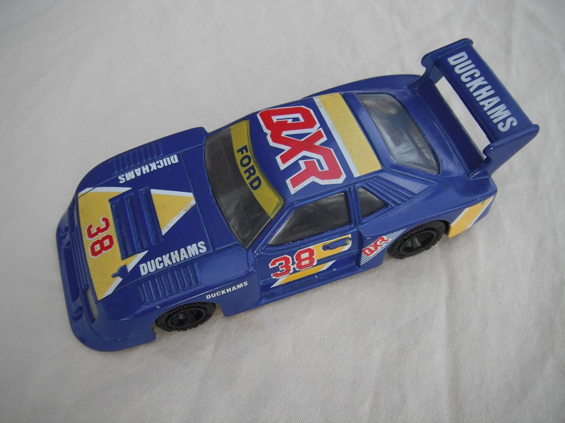 12.Blue &amp; yellow body/black base China/clear windows/black interior/no chromed lettering on wheels/QXR Duckhams #38.