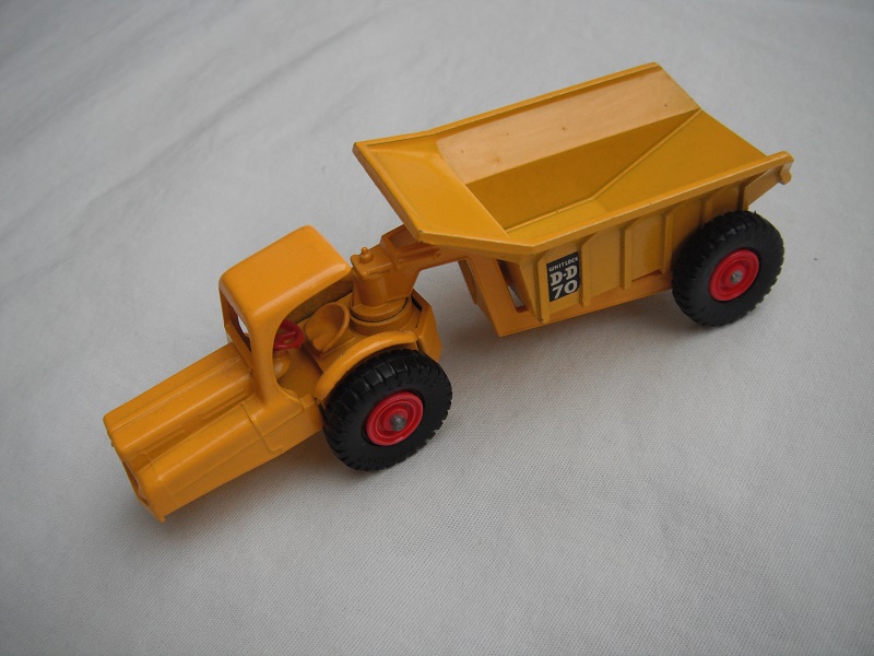 3. Yellow body/rounded rivet on base/red wheels/black tires/rounded axles/red steering wheel/side decals.