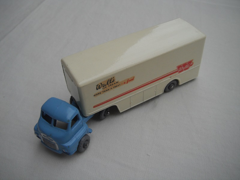 4. Mid blue cab//type 2/gloss black base/GPKW/type 2 trim/off white trailer/Wall's Ice cream to front.