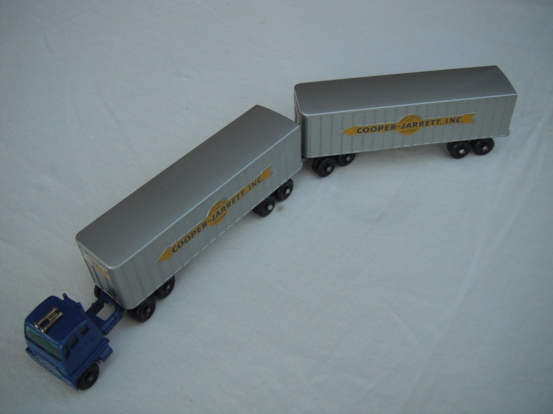 5. Blu cab/blk base type B/wheels type B/gold horns/sil trim/sil-gry trailer type B/base type B/legend type B/sil rear doors/dolly type B/decals type B.