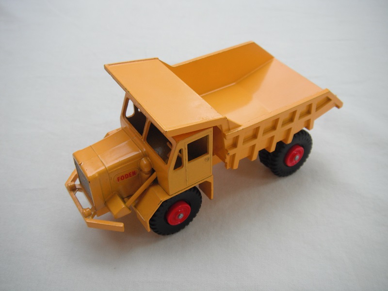 5. Yellow body/BPT w/red plastic hubs/smooth casting underneath tipper/long steering column/&quot;Foden&quot; decals.