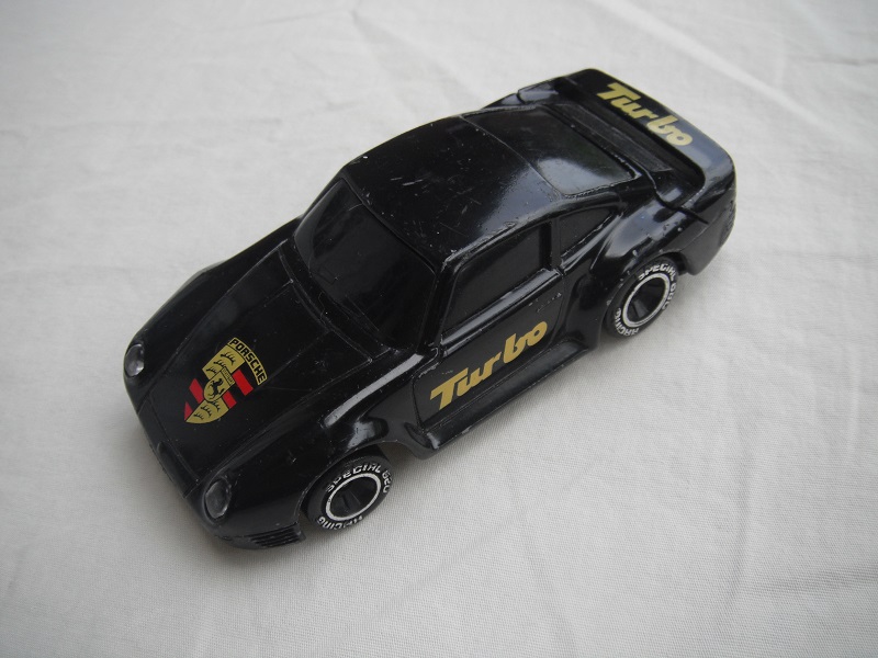 13.Black body/black base China/no interior/blackened windows/chromed lettering on wheels/alarm &amp; working lights/Turbo.