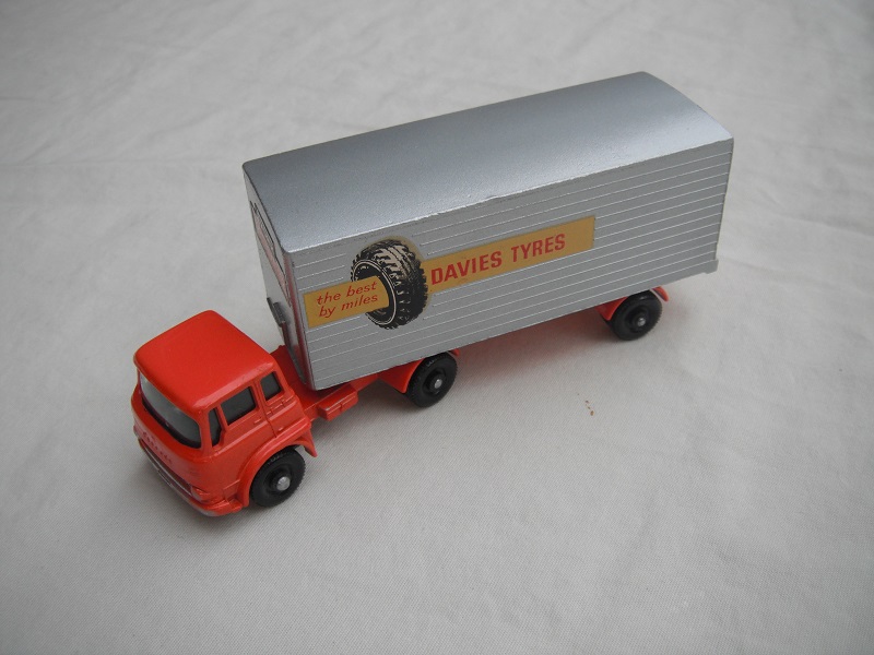 3. Lt.orange cab/blk base/BPFW/grn windows/sil trailer/typ A/lt.org base/centered connector/org rear door/Davies Tyres decals.