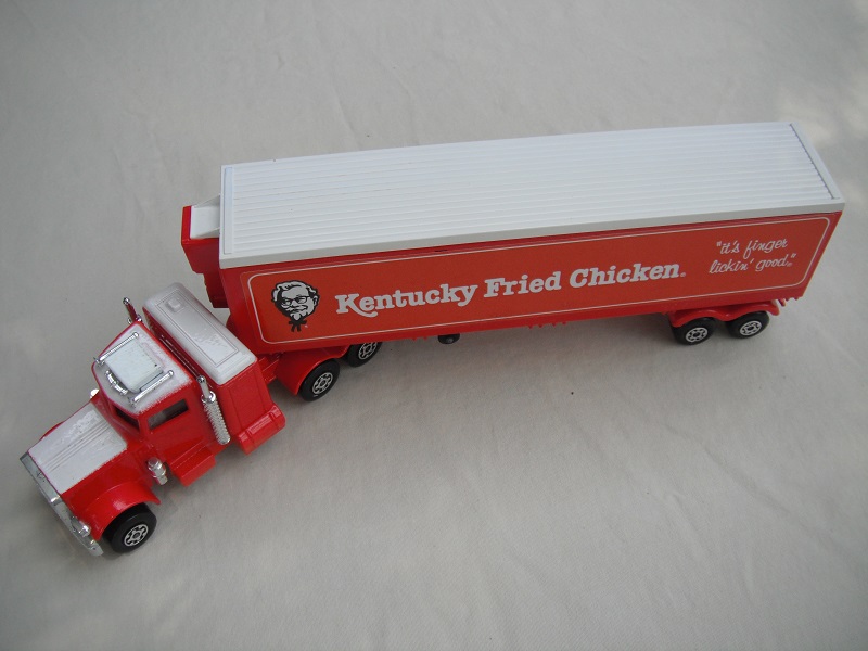 2. Lt. red cab/type C light red base/white hood, roof, AC &amp; sleeper/LMCW/lt.red trailer/K17/1973 Lesney base/SMCW/black open axle cover.