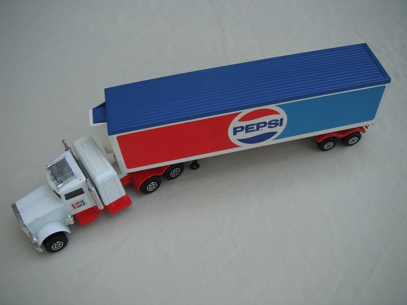 2. White cab/type D red base/unpainted AC/LMCW/blue trailer top /red 1973 Lesney base/SMCW/black closed axle cover.