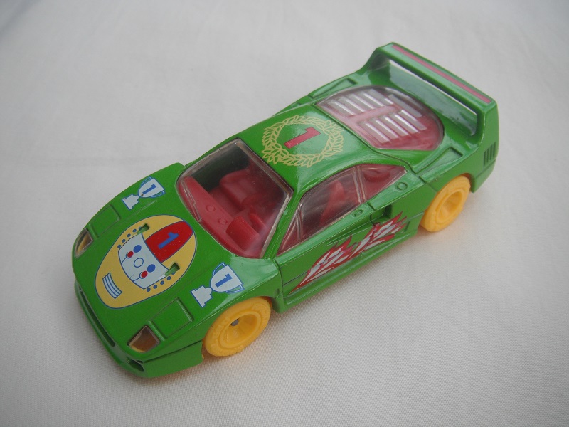 6. Lt.green body/Specials/yellow China base/racing special yellow whls/clear windows/red interior/&quot;1&quot; and various logos.