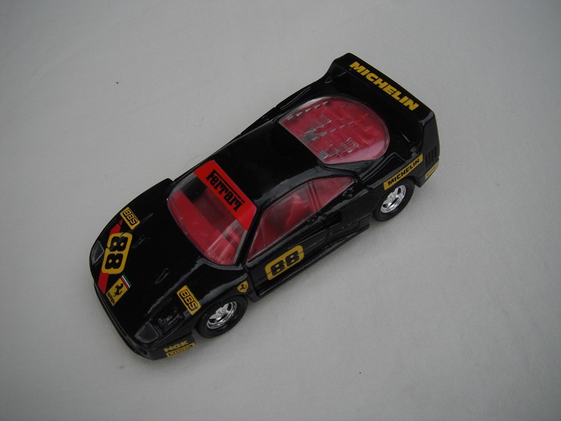 2. Black body/Specials/gray Macau base/chrome 5 spoke star whls/clr windows/red int/chrome engine/&quot;88&quot; Ferrari &amp; Michelin.