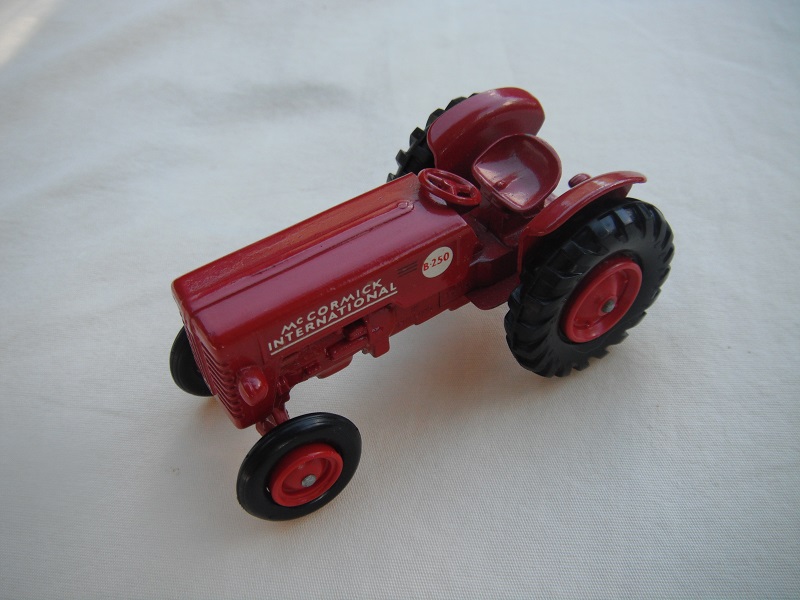 7. Red body &amp; base/hole on base/red plastic hubs/round tow hook/red headlights/large decal.