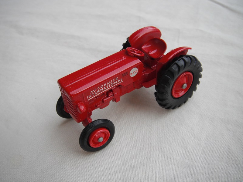 6. Red body &amp; base/no hole on base/red plastic hubs/round tow hook/red headlights/large decal.