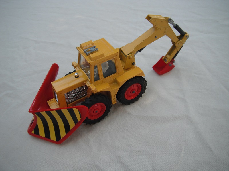 11.Yellow tractor/dark red plow w/black &amp; yel stripes/yel backhoe &amp; red scoop/clear windows/thin tires/dk.red hubs/blk int/1972 England cast.