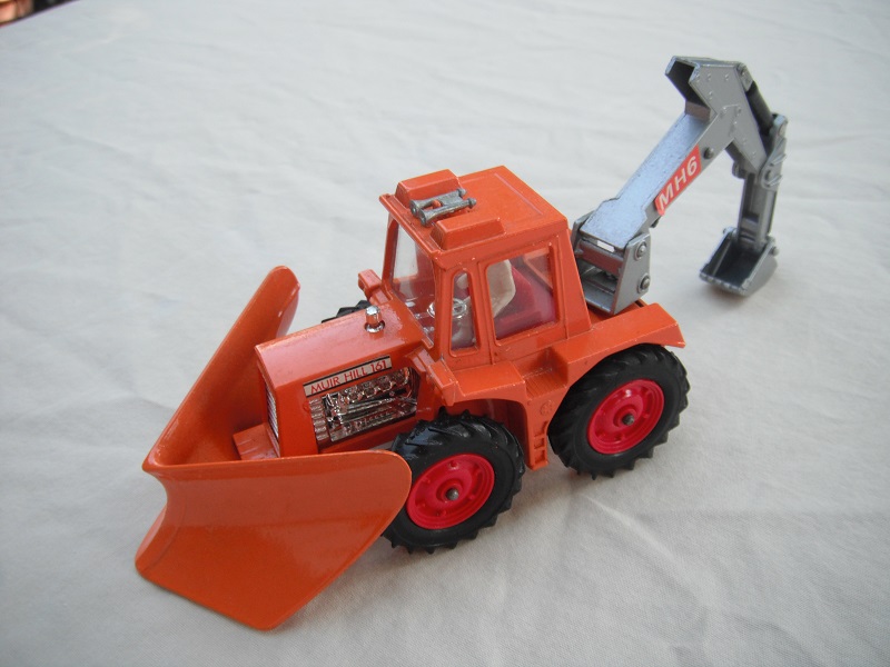 5. Lt. orange tractor/org plow/sil backhoe &amp; scoop/clear windows/thin tires/dk.red hubs/dk.red int/1972 England cast/MH6 labels.