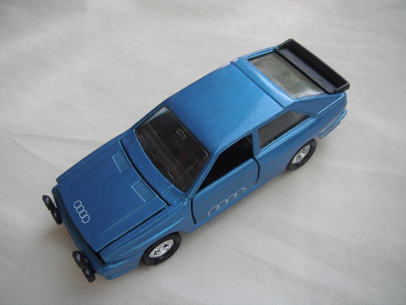 23.Blue body/black China base/5 spoke mag wheels/clear windows/clear headlights/&quot;Audi logo on hood &amp; side doors.