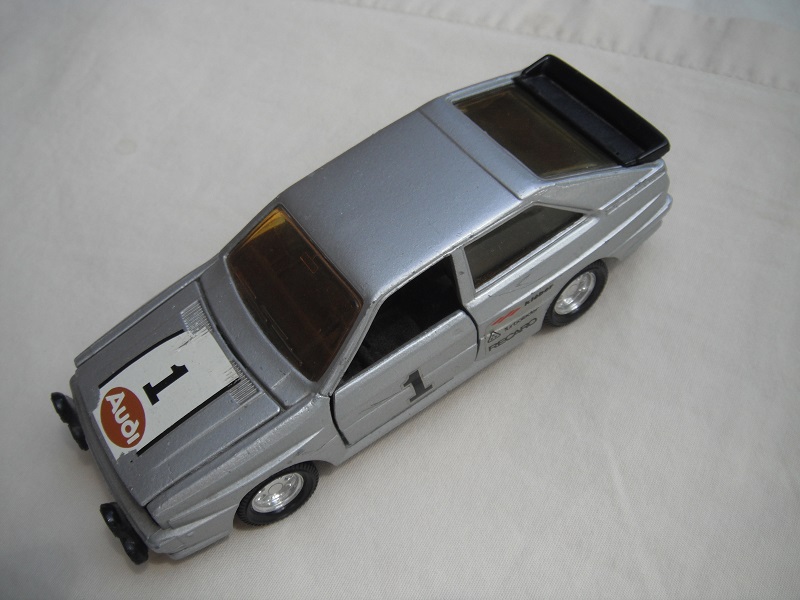 7. Silver body/black England base/8 dot disc wheels/amber windows/Audi &quot;1&quot; on hood and side doors.