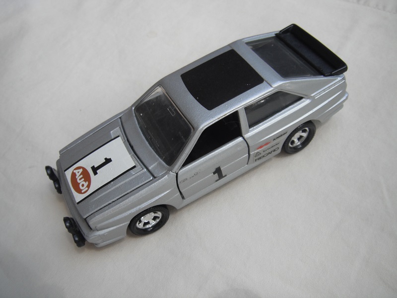 4. Silver body/black England base/5 spoke mag wheels/clear windows/Audi &quot;1&quot; on hood and side doors/black roof label.