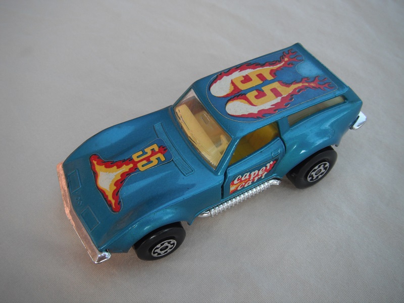 14.Metallic blue body/silver base/Speedkings/MC wheels/clear windows/yellow interior/caper cart on doors/&quot;55&quot; in yellow/flames on hood &amp; roof.