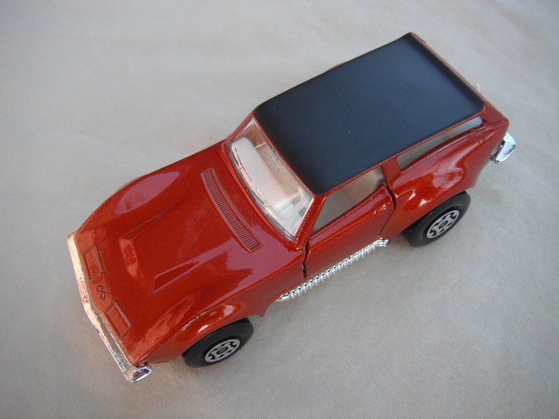 9. Metallic copper body/flat black roof/silver base/Superkings/MC wheels/clear windows/white interior/no labels.