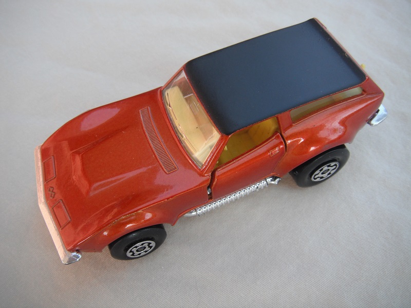 8. Lt.metallic copper body/flat black roof/silver base/Speedkings/MC wheels/clear windows/white interior/no labels.