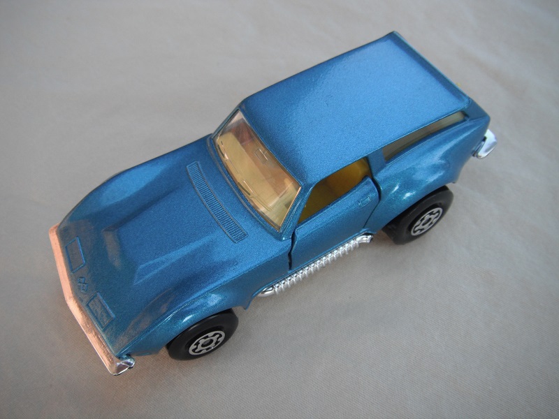 5. Metallic blue body/silver base/Superkings/MC wheels/clear windows/yellow interior/no labels.