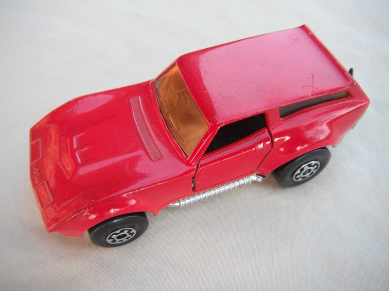 2. Red body/black base/Speedkings/MC wheels/light amber windows/black interior/no labels/PP.